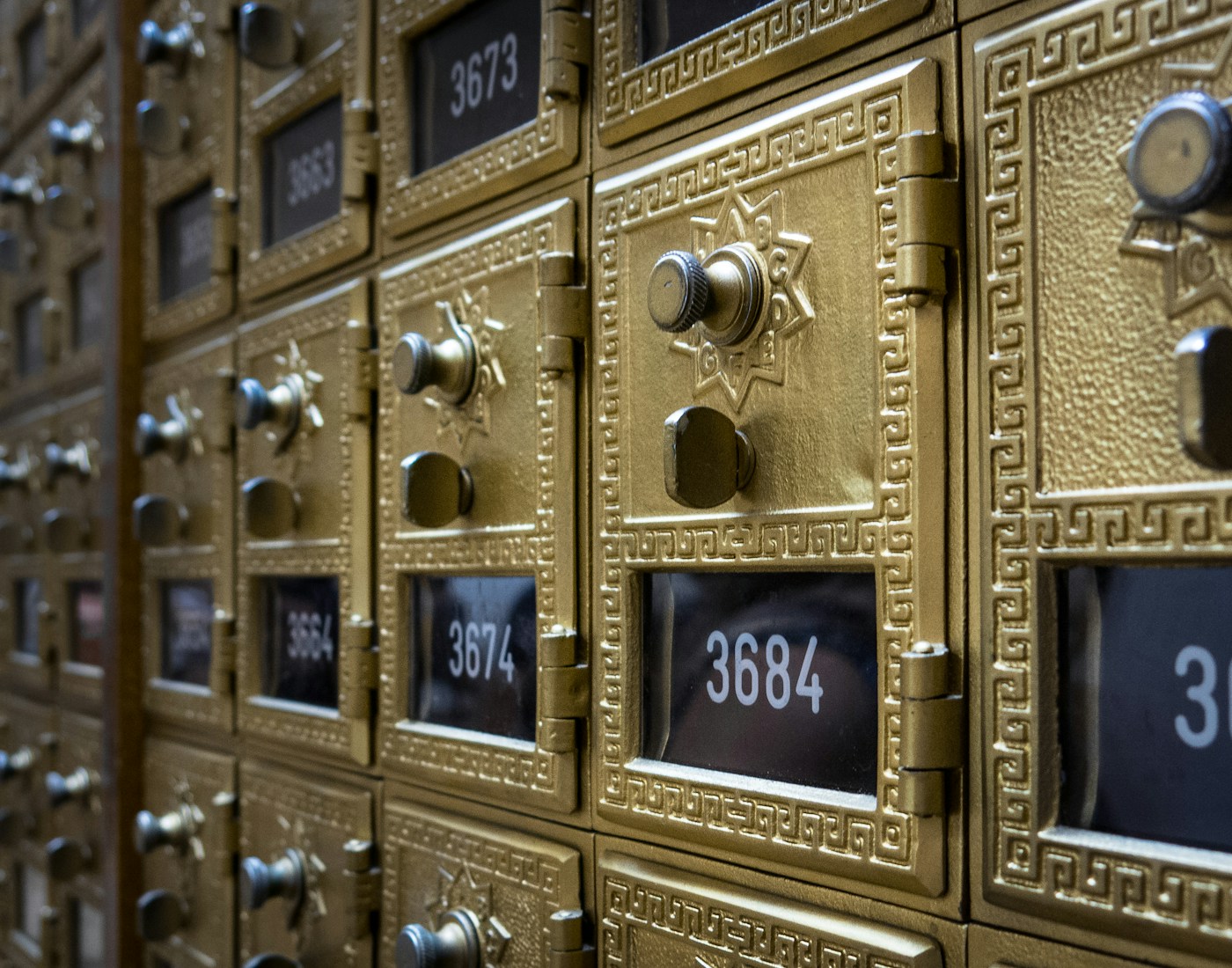 Rows of numbered mailboxes