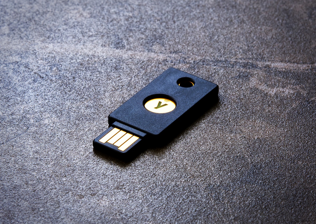 Hardware security key on a textured surface